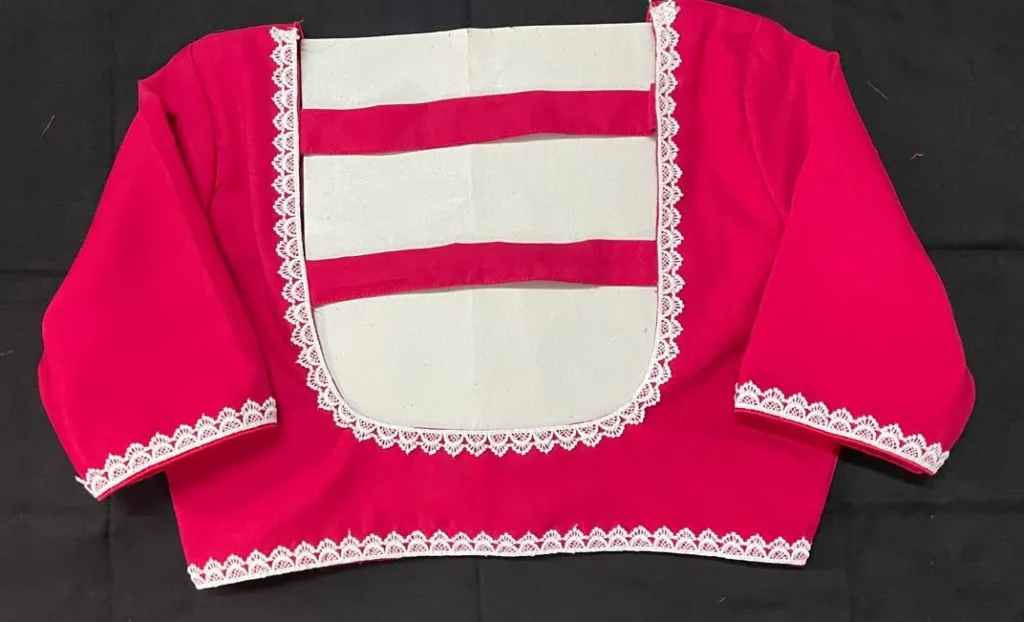 Rani pink blouse design with white lace and back straps